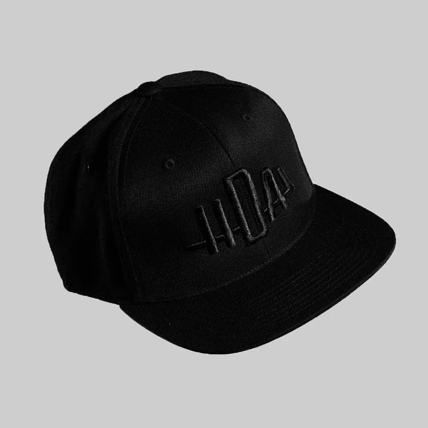 Monogram Snapback Cap | Black Logo